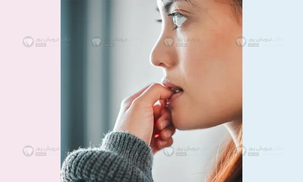 جویدن ناخن و تحلیل مینای دندان